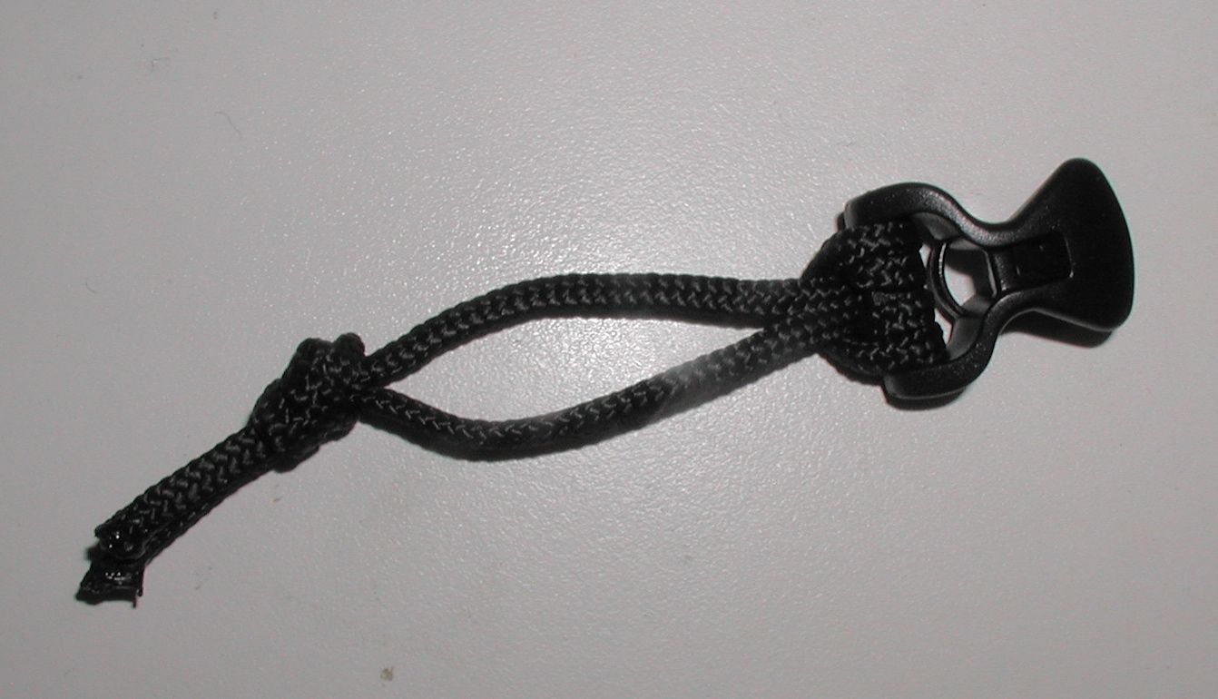Use a 12" or longer piece of 2-3 mm cord. Use a 2 wrap prussic knot on the Line Lock. Form a loop in the cord.